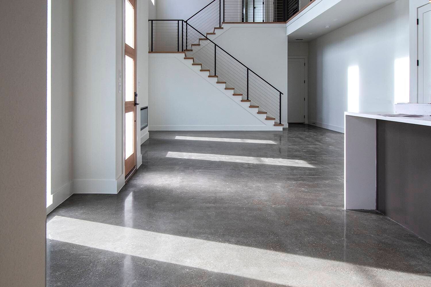 Polished concrete hallway and stair entry