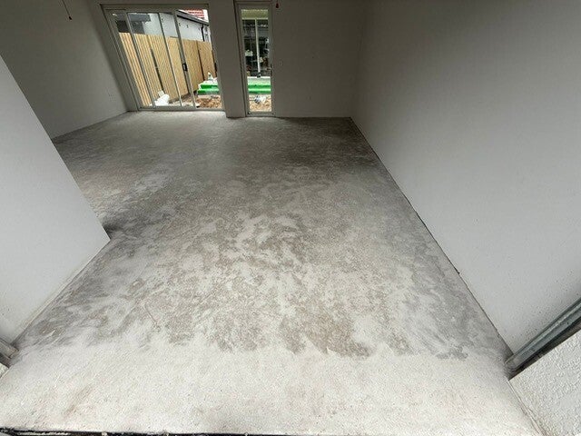 Concrete garage floor ground back ready for coating