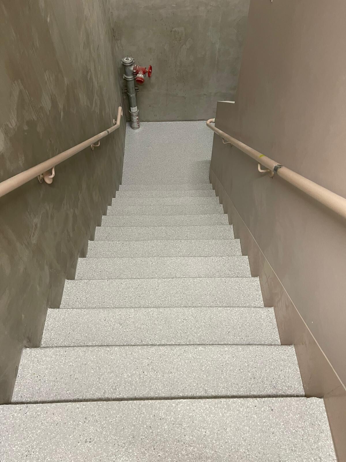 Flake epoxy coated stairs and landing
