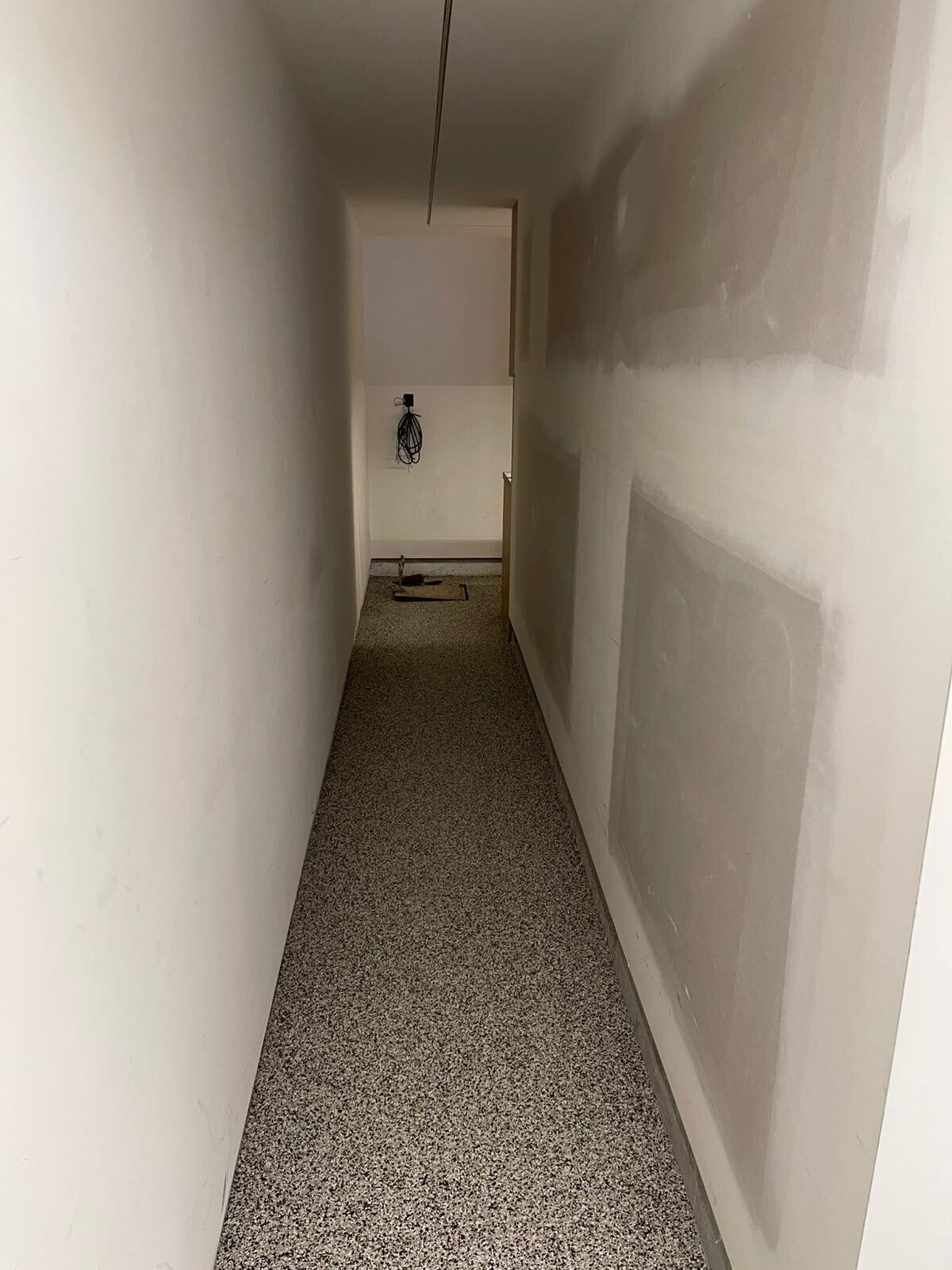 Flake epoxy coating in a narrow interior corridor
